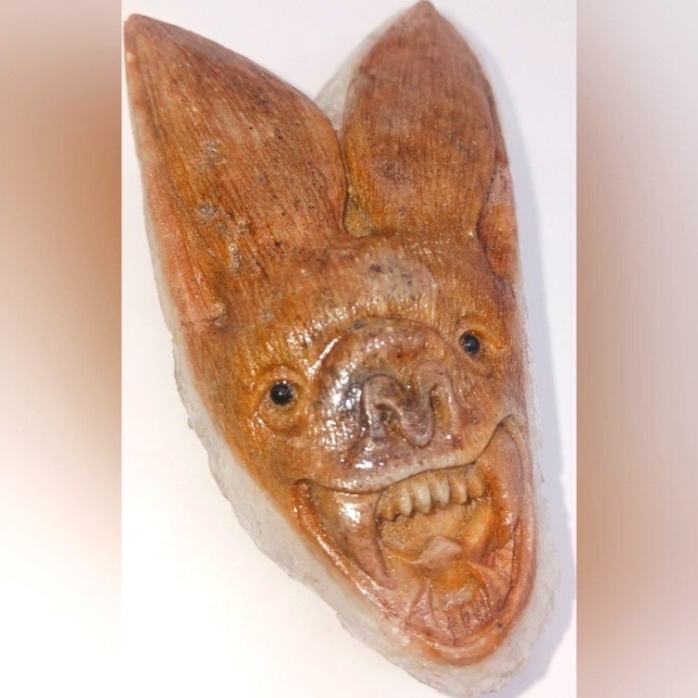 Quartz crystal natural mineral specimen hand carved Bat his name is COVID 19